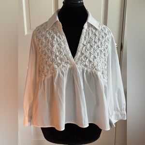White smocked blouse